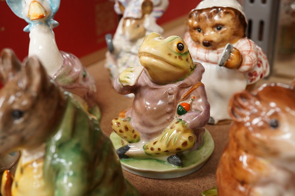 Nineteen Beatrix Potter character stamped F Warne and Co, Beswick, 10cm